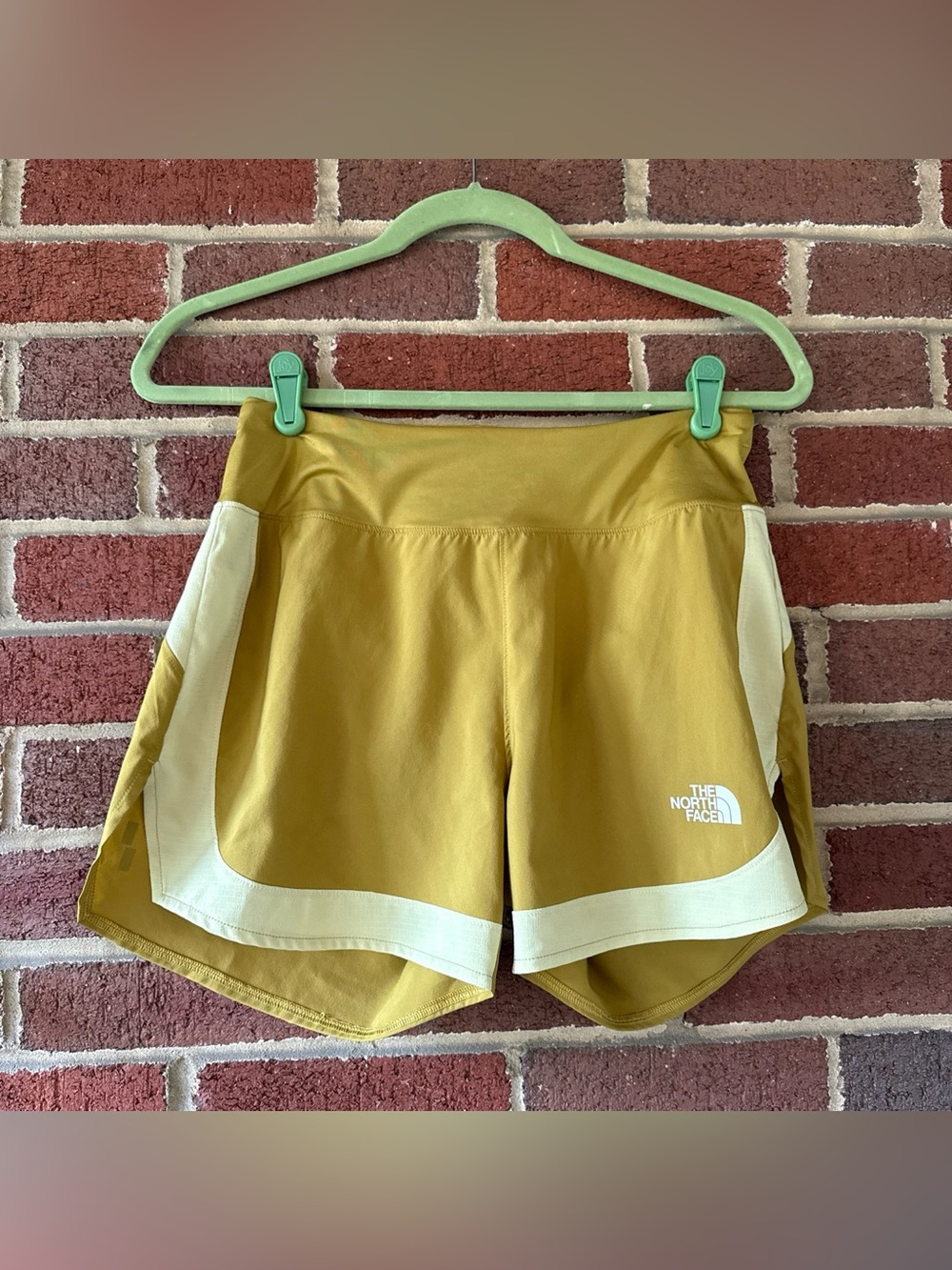 The North Face Women's Mustard Yellow Athletic Shorts with Cream Trim